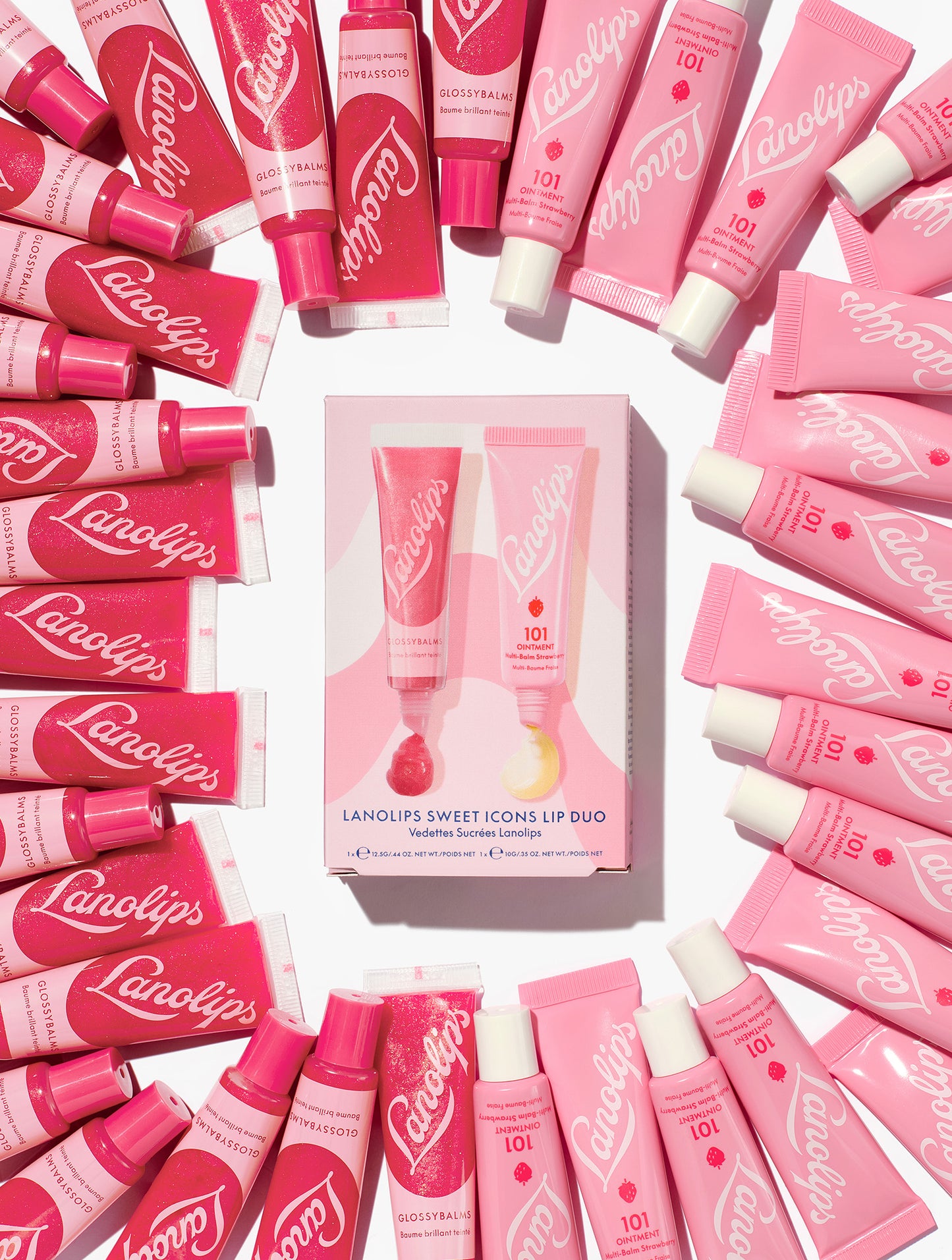 Lifestyle shot of the Lanolips Sweet Icons Lip Duo. The duo contains two bestsellers to hydrate and gloss your lips to the perfect pout - Glossy Balm Candy and 101 Ointment Multi-Balm Strawberry.