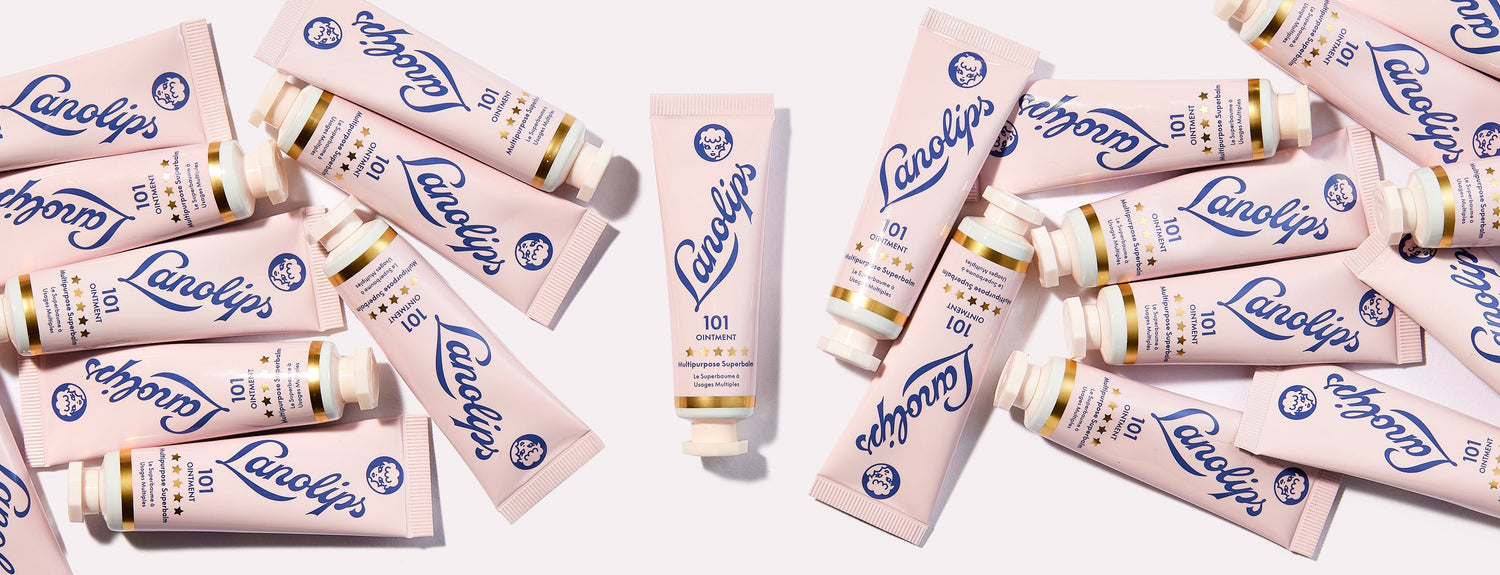 Lanolips 101 ointment multipurpose superbalm tube surrounded by many tubes