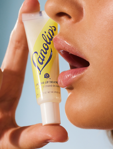 Close up shot of model wearing Lanolips Lemonaid Lip Treatment