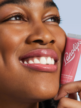 Model with Tinted Lip Balm in Rhubarb