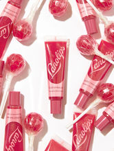 Lanolips' Glossy Balm Candy a fruity pink tint with added gold flecks for the ultimate glossy tint