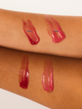 Arm swatches of Glossybalms in Berry and Candy.